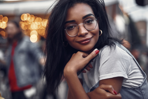 Woman with eyeglasses considering LASIK